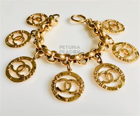 gold chanel charms|authentic Chanel charm bracelets.